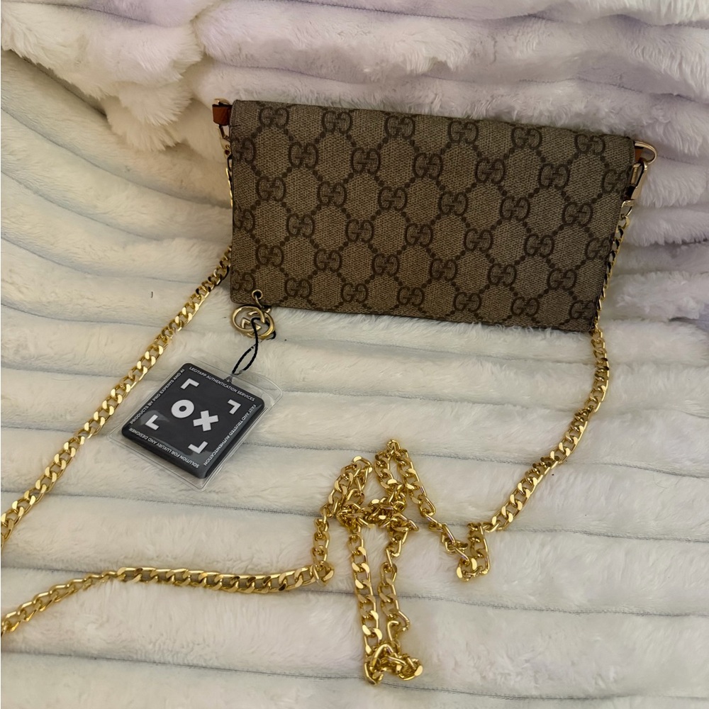 Gucci Brown GG Supreme Canvas Continental wallet